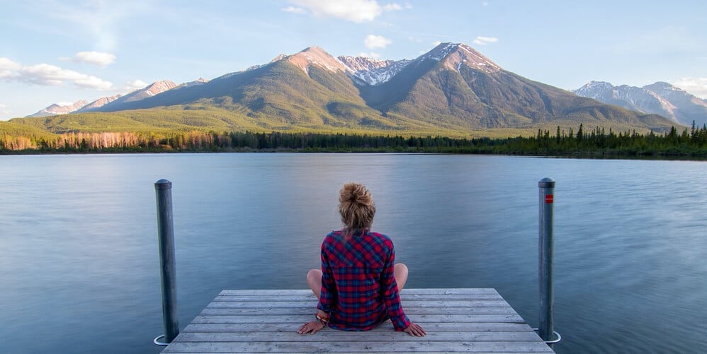Woman relaxing on jetty